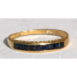 A 9ct gold sapphire half-eternity ring, approx UK size 'N'.