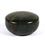 A Chinese moss agate seal paste box of circular form, 6cms (2.25ins) diameter.