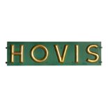A large vintage Hovis Bread advertising sign with raised gilt lettering on a green ground, 162cms (