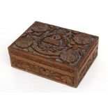 An ornately carved wood trench art East Lancashire Regiment cigarette box. 20.5cms (8ins) by