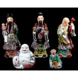 A group of Chinese famille rose figures, to include Shoulau and scholars the largest 25cms (9.75ins)