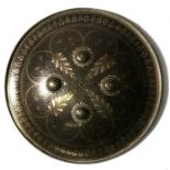 An Indo-Persian steel dhal shield, 28cms (11ins) diameter.