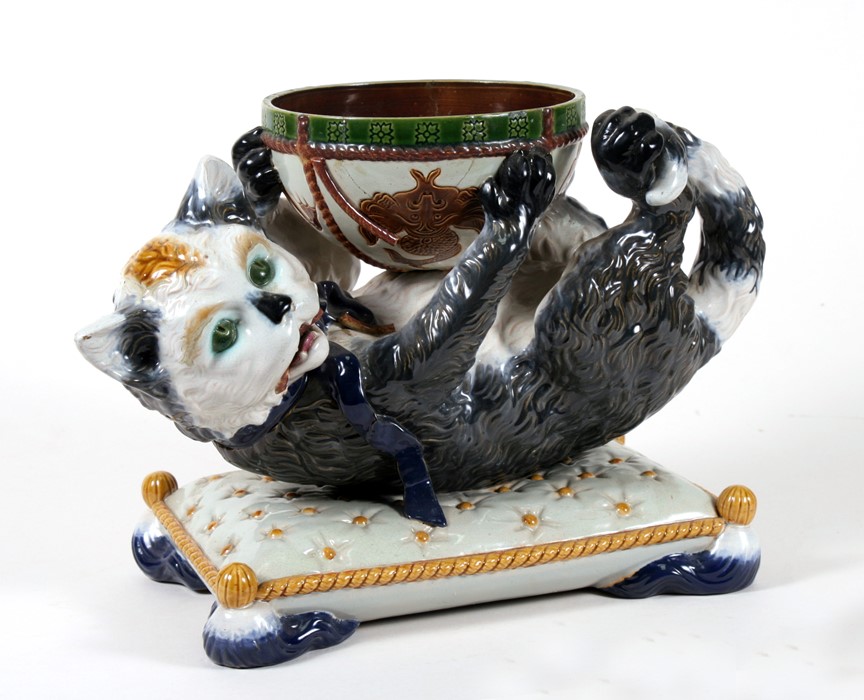 A Victorian Gerbing & Stephan majolica centrepiece, the bowl supported by a cat on a cushion,