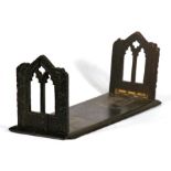 A Victorian Irish bog oak folding book rack, 41cms (16ins) wide.