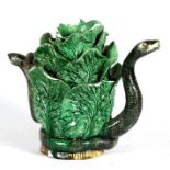 A Portuguese Palissy ware cabbage form teapot with snake handle & spout, 22cms (8.7ins) high (a/f).