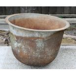 A cast iron washing copper / planter. 53cm (21 ins) diameter