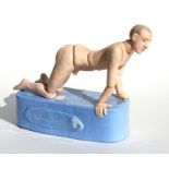 Tatiana Antoshina (Russian b1956) a glazed articulated pottery figure of a naked man kneeling on a