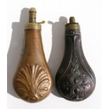 Two copper shot flasks, 20cms (8ins) and 17cms (6.75ins) high (2).