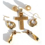 A 9ct gold crucifix pendant; together with three pairs of gold earrings, total weight 4.7g.