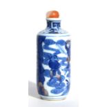 A Chinese snuff bottle decorated with warriors and mythical beasts, 9cms (3.5ins) high.Condition