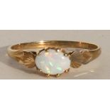A 9ct gold opal dress ring, approx UK size 'L'.