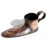 A 19th century copper ale slipper, 29cms (9.5ins) long.