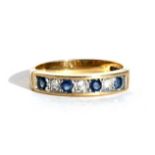 A 9ct gold diamond and sapphire half eternity ring, approx UK size 'M'.
