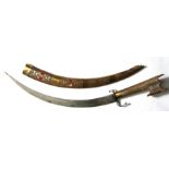 A Moroccan Nimcha in inlaid wooden scabbard, 57cms (22.5ins) long.