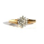 A 9ct gold diamond cluster ring, approx UK size 'K'.