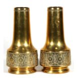 A pair of WMF brass vases, 29cms (11.5ins) high.