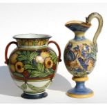 An Italian majolica jug decorated with a classical scene, 35cms (13.5ins) high; together with a