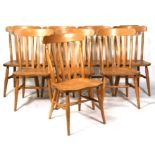 A set of eight beech farmhouse kitchen chairs.