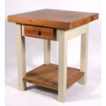 A pine butcher's block kitchen work station with single frieze drawer, on square legs with under-