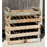 A group of five wooden apple crates.