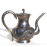 A Chinese silver teapot with faux bamboo spout & finial and decorated in relief with a scrolling