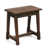 An Arts & Crafts oak joint stool, 46cms (18ins) wide.