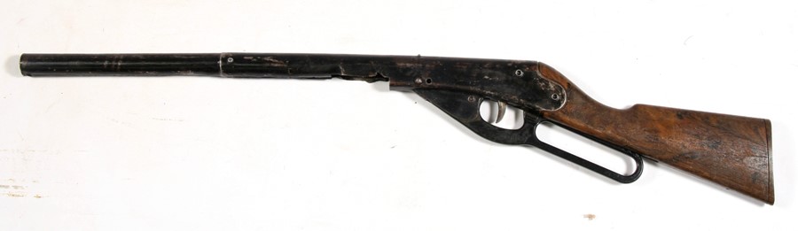 A child's Daisy cork gun, 76cms (30ins) long.