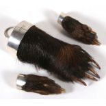 Taxidermy: A paw key fob engraved Airhouse together with two paw brooches, one mount marked Sterling