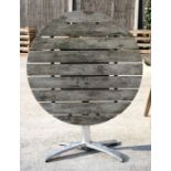 A teak and aluminium circular tilt-top garden table, 90cms (35.5ins) diameter.