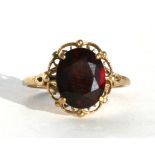 A 9ct gold garnet set ring, approx UK size 'L'.