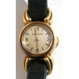 A ladies Jaeger Le Coultre 18ct gold cased wrist watch with back wind movement.