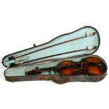 An early 20th century two-piece back violin, stamped 'Stainer', 59cms (23.25ins) long; together with