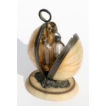 A Palais-Royal gilt metal mother of pearl and alabaster scent bottle stand dividing to reveal four