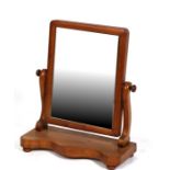 A Victorian mahogany toilet mirror, 45cms (17.75ins) wide.