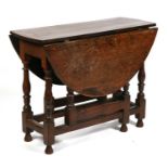 An 18th / 19th century oak gateleg table, 94cms (37ins) wide.Condition Report General nicks,