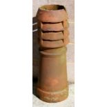 A large terracotta chimney pot, 91cms (35.75ins) high.