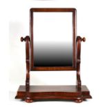 A Victorian mahogany toilet mirror, 46cms (18ins) wide.