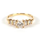A 14ct gold dress ring set with various cut white stones, approx UK size 'U'.