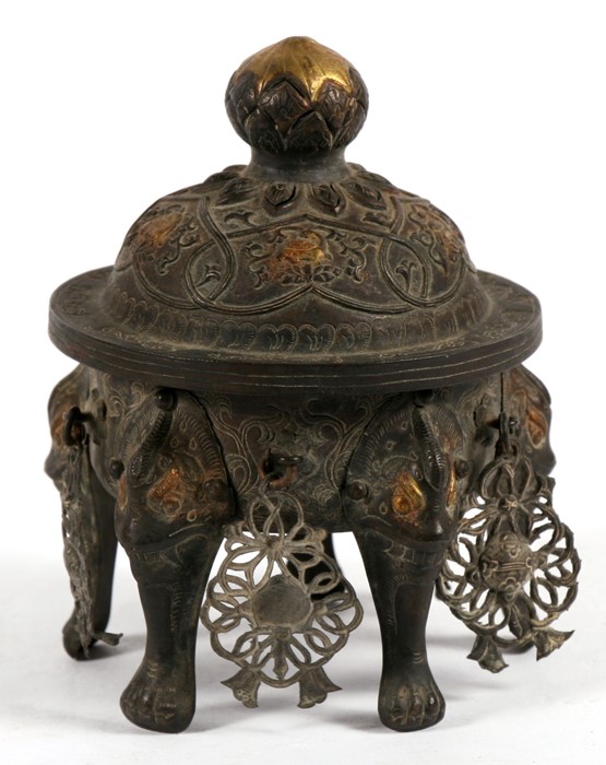 A Chinese bronzed censer standing on five mask capped legs 11cm (4.25ins) high