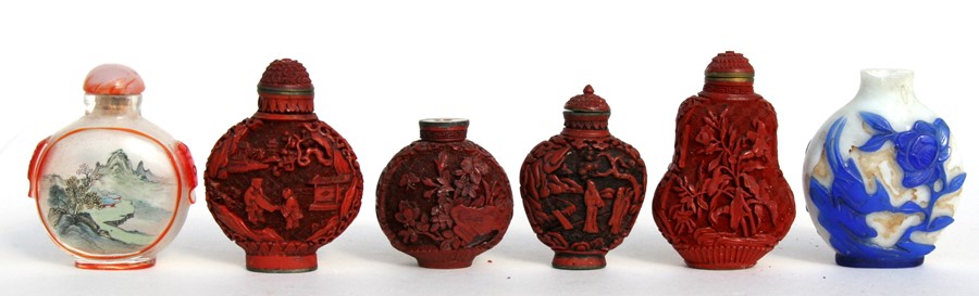 A group of six Chinese snuff bottles, to include two Peking glass snuff bottles and four cinnabar