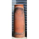 A large terracotta chimney pot, 89cms (35ins) high.