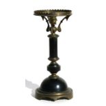 A Christopher Dresser style ebony & brass oil lamp base, converted to electricity, 37cms (14.5ins)