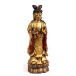 A large Chinese gilded wooden figure depicting Guanyin, 74cms (29ins) high.Condition Report Good