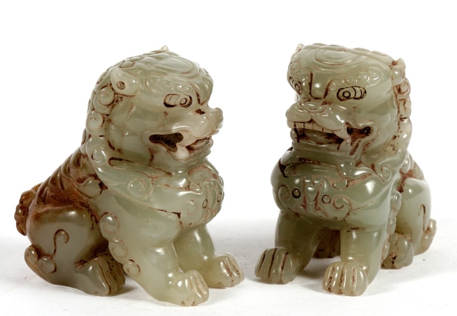 A pair of Chinese jade temple lions. 7.5cm (3ins) high