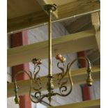 An Art Nouveau copper & brass twin-arm ceiling light (glass shades present).