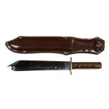 A large Bowie knife in leather scabbard, 40cms (15.75ins) long.