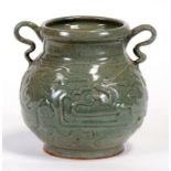 A celadon glazed two-handled vase, 15cms (6ins) high.