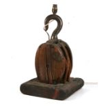 An unusual table lamp converted from a marine block and tackle, 51cms (20ins) high.