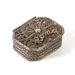 A silver filigree pill box, 3.5cms (1.5ins) wide.