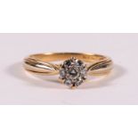 An 18ct gold diamond cluster ring, approx UK size